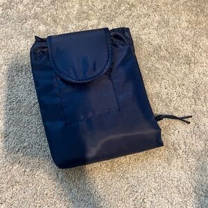 Make up holder cinch bag adjustable